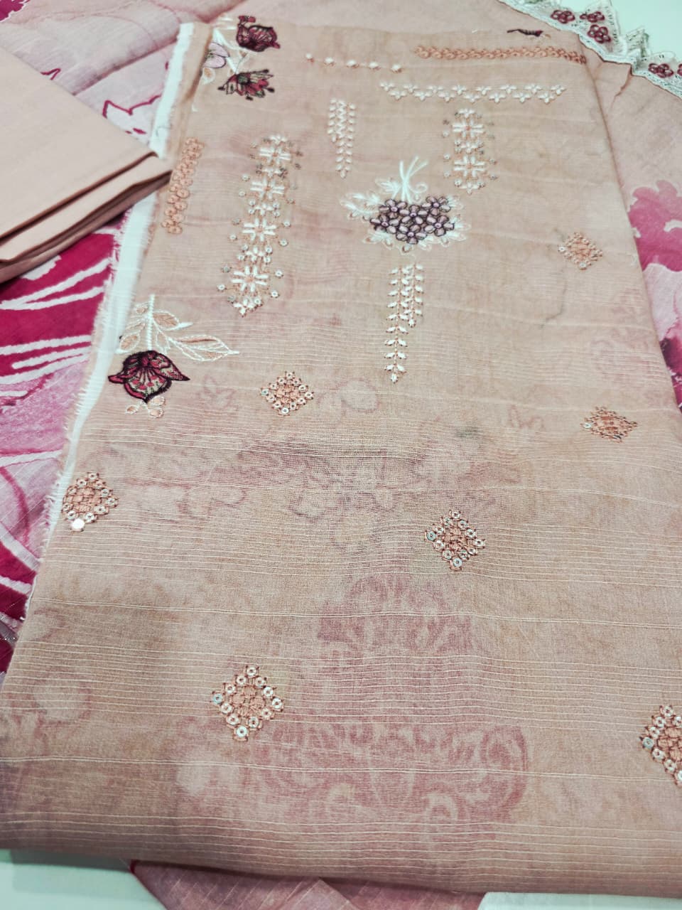 Luxury Rose Pink Unstitched Lawn 3 Piece Suit - Elegant Embroidered Neckline Dress with Magenta Floral Printed Scalloped Border Dupatta