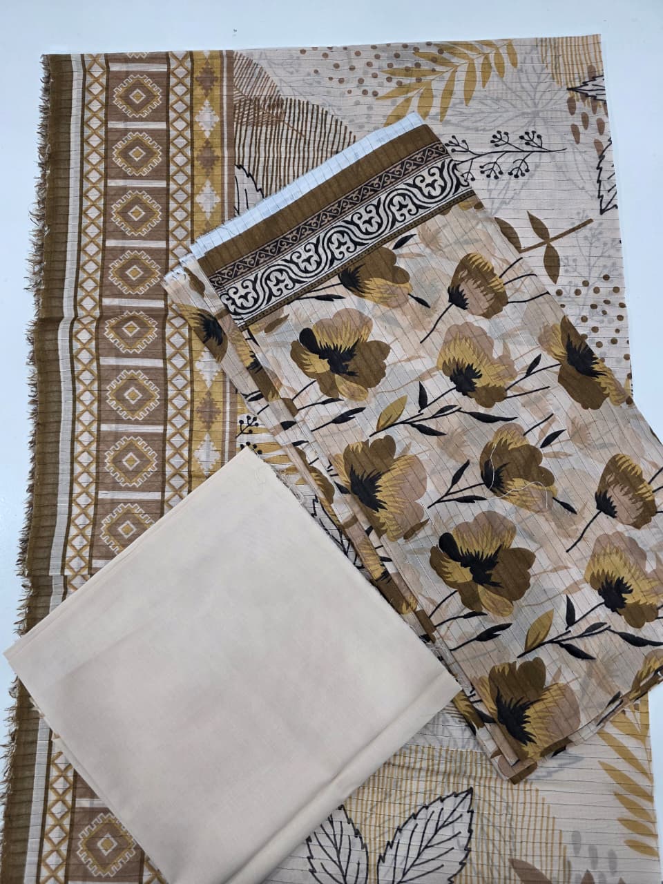 Premium Khaki Beige Floral Printed Lawn 3 Pc Suit - Unstitched Summer Ensemble with Ochre Geometric Border Doriya Dupatta & Dyed Trouser